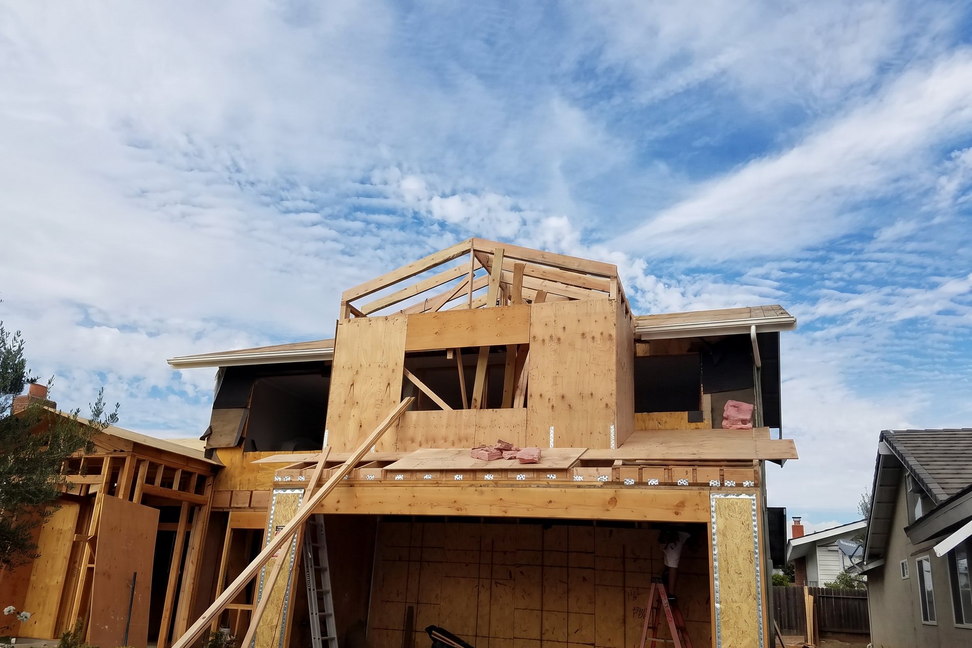 A second story going up in framing and sheathing on a Newport Beach house