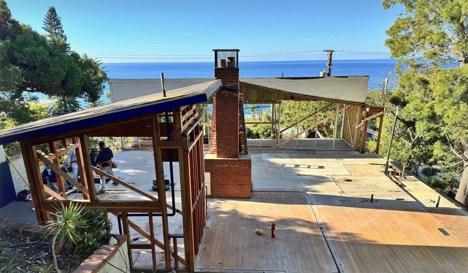 The house stripped back to its frame, open to the ocean