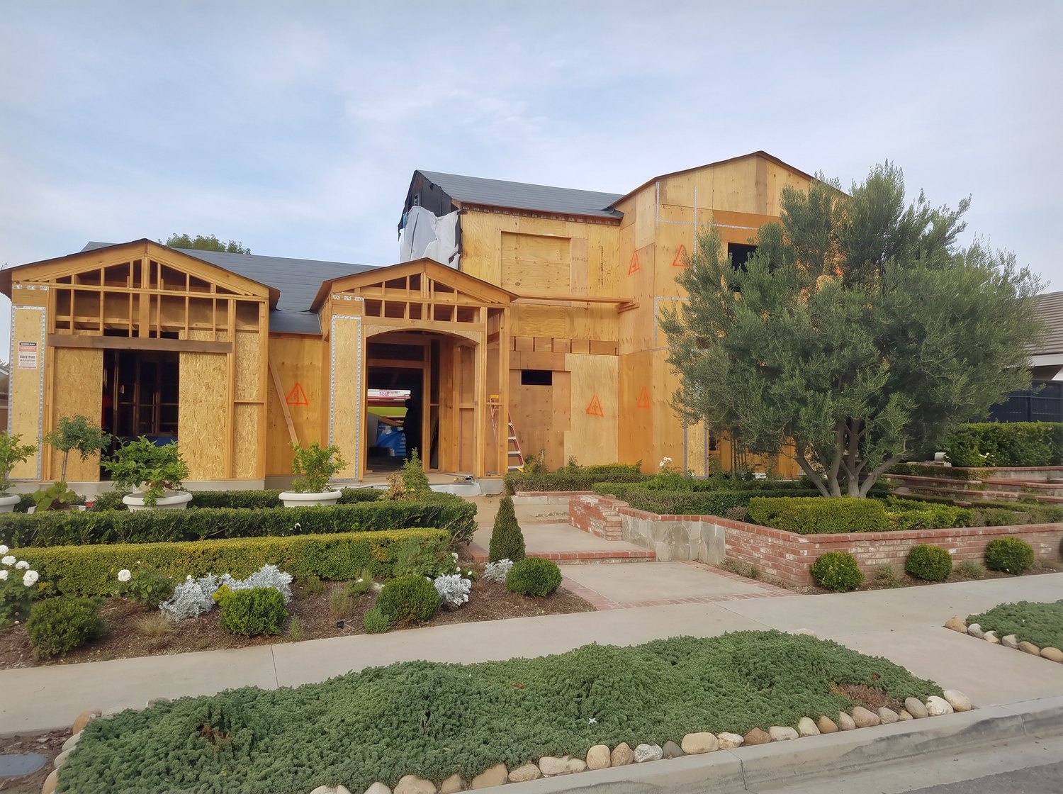 A house in framing and sheathing, before cladding
