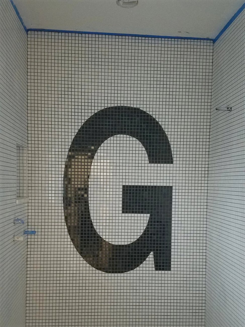 The shower wall, being set