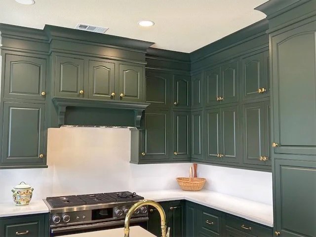 Cabinetry carried to the ceiling, and fitted to what was already there