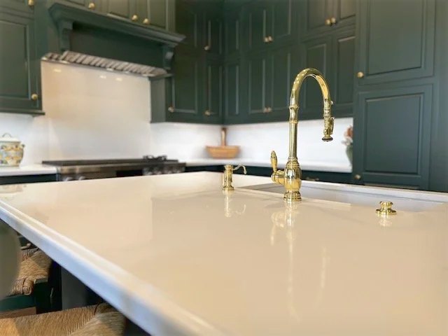 Brass on the island, and the surfaces it sits in